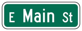 Figure 18. An image of a street name (MUTCD D3-1) sign that reads 'E Main St'.