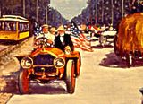 two people riding in an early automobile with U.S. flag