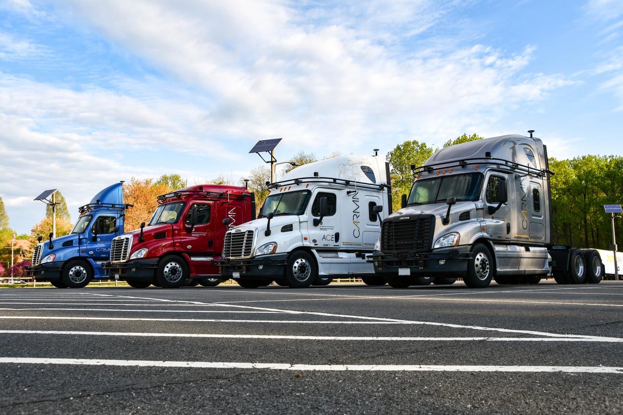 "Four CARMA freight fleet trucks."