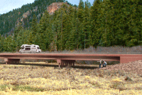 An image of the bridge digitally added to the valley image with the bridge concrete in pink..