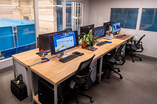 "computer monitors running CFD simulations in the Advanced Computing Center."