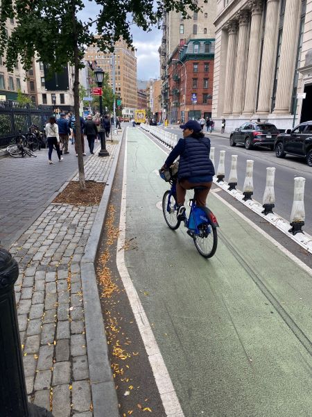 Separated bicycle line with one bicyclist in New York City