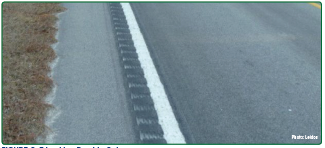 "Edge line rumble strip on the side of a road."