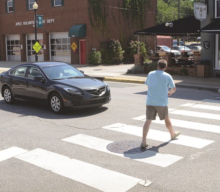 a man in a crosswalk