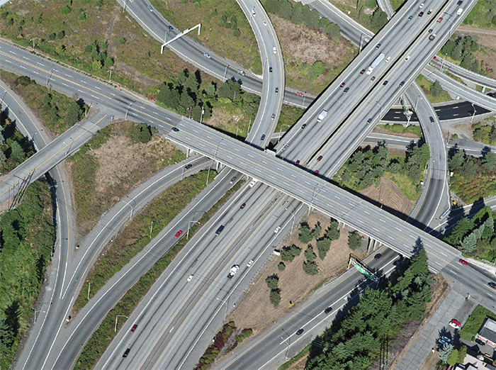 "Aerial photo of numerous highways and their interchanges"