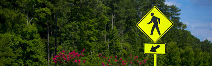 Yield to Pedesterian street sign