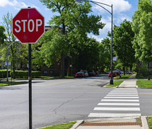 image of stop sign and crosswalk