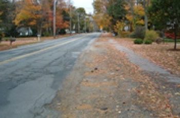 "Photos.  Two photos showing an existing road and potential improvements.  The photo on the left shows an existing two-lane highway with wide lanes."