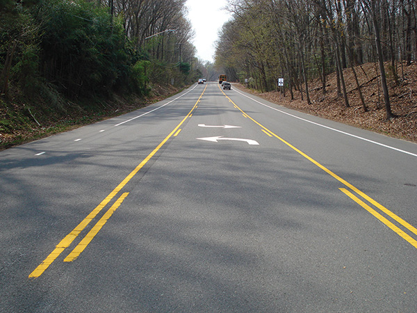 Figure 59. A picture of a highway section that has been converted into one travel lane in each direction with a center two-way left-turn lane.