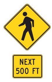 Image of a pedestrian warning sign and supplemental distance plaque that reads 'Next 500 feet,' indicating pedestrians may be present in a crosswalk at that distance ahead. Sign is from the Manual on Uniform Traffic Control devices.