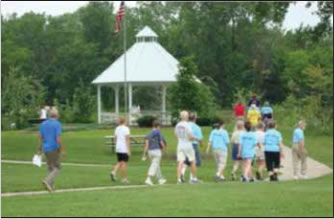 Photo: Caption:Figure 4: Community Walking Event in Wabasha, Minnesota. 