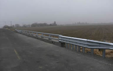 "photo of the installed bridge guard rail"