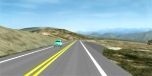 A screen grab of a 3D animation example of a car on a highway.