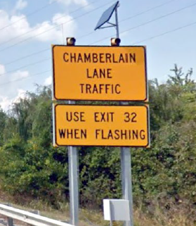 "sign: Chamberlain Lane Traffic | Use Exit 32 When Flashing"