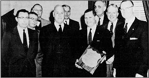 Photo: Francis C. Turner, Clifton W. Enfield, George M. Williams, Sinclair Weeks, James C. Allen, John A. Volpe, Arthur C. Clark, Edward H. Ted Holmes, and Charles D. Curtiss.