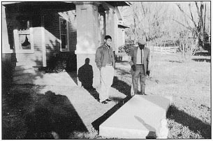 A stop on the Roadtour: Accompanied by Mayor Fred Montgomery of Henning TN, Administrator Rodney Slater visits the home and gravesite of writer/historian Alex Haley (author of Roots). His epitaph, "Find the Good and Praise It," captures the spirit of the Roadtour.