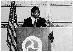 Administrator Rodney E. Slator explaining the purpose of the National Highway System during a ceremony in Washington's Union Station.