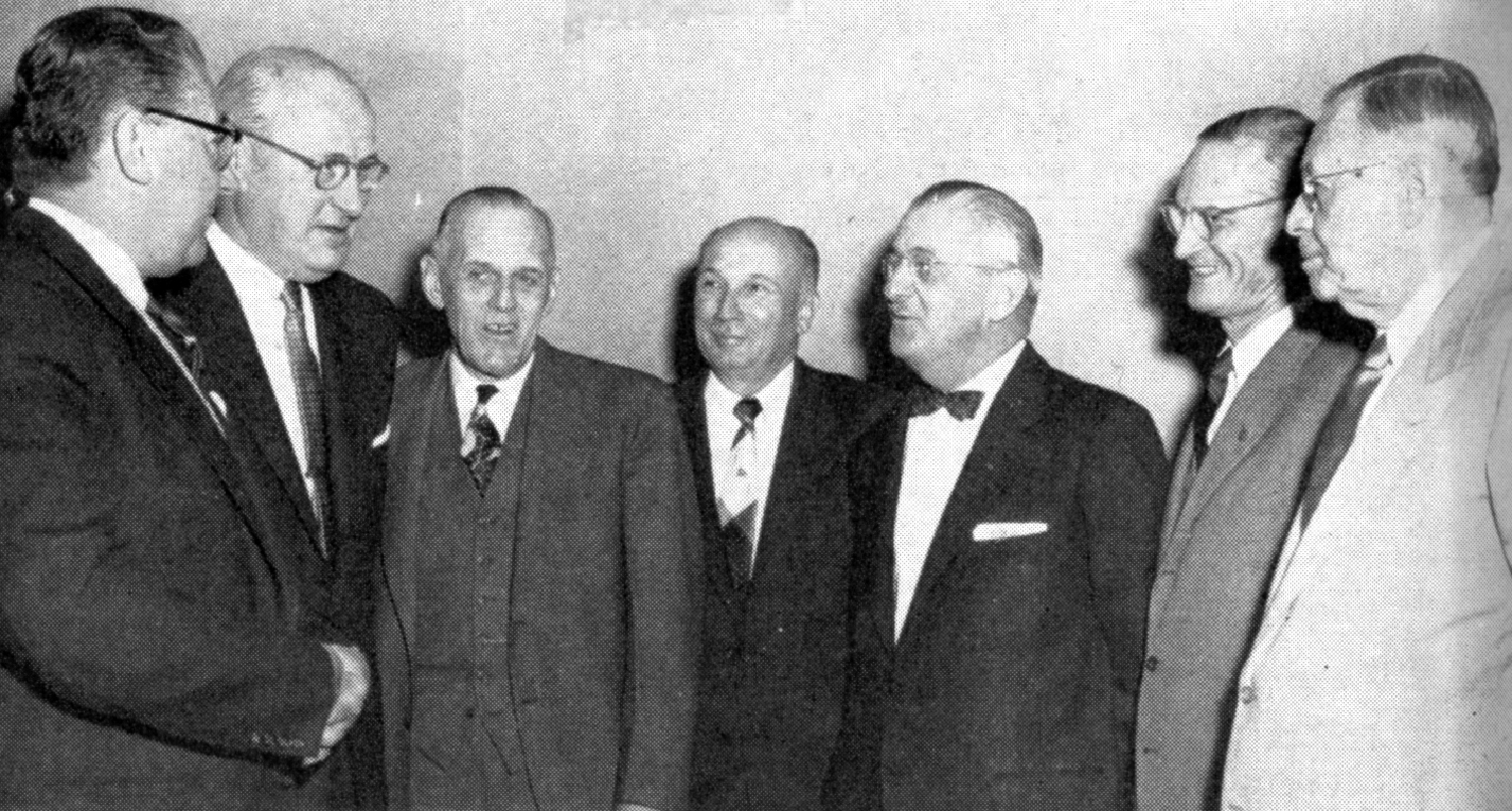 Left to right: Burton F. Miller, managing director of the division; Chairman Fallon; Francis V. du Pont, former U.S. Commissioner of Public Roads, now special assistant to the Secretary of Commerce for promoting the President’s program; L. W. Lam of Lamb Construction Company, MI; John N. Robertson, ARBA president and Director of Highways, DC; Charles D. "Cap" Curtiss, Commissioner of Public Roads; and Lt. General Eugene Reybold, executive vice president of ARBA.