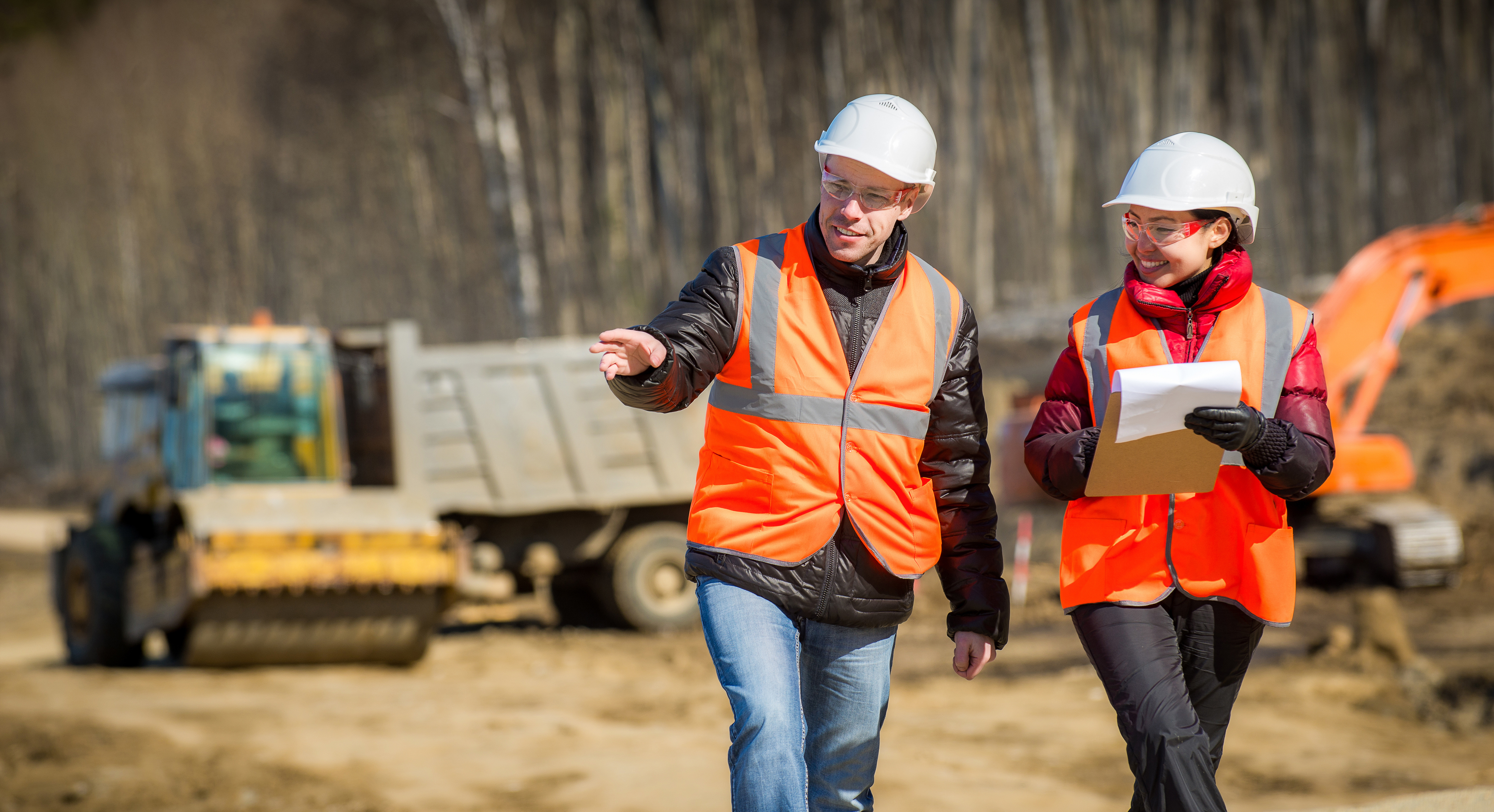 People Inspecting a Road Being Built