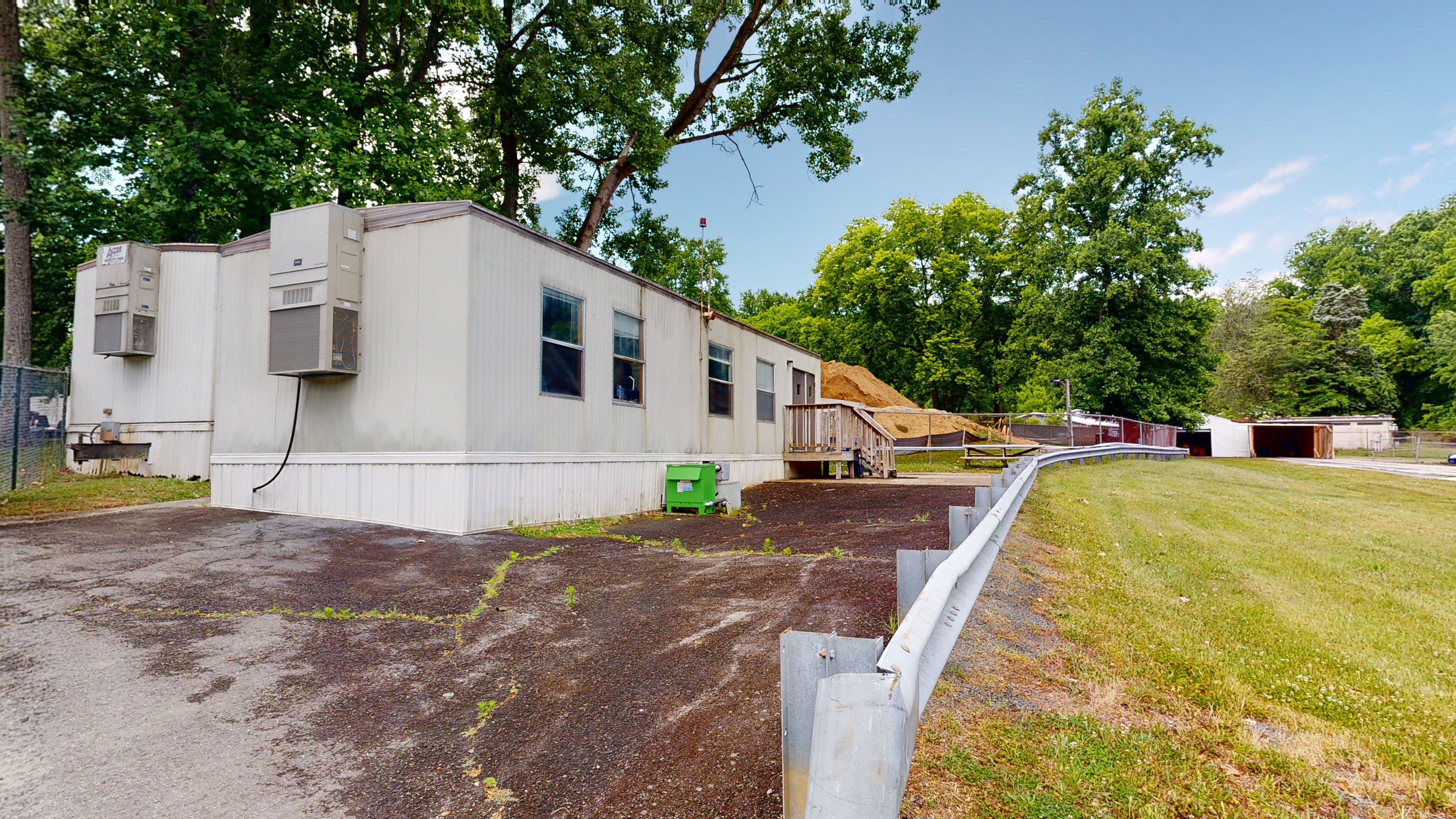 A closeup view of trailer facilities in an outdoor testing area. 