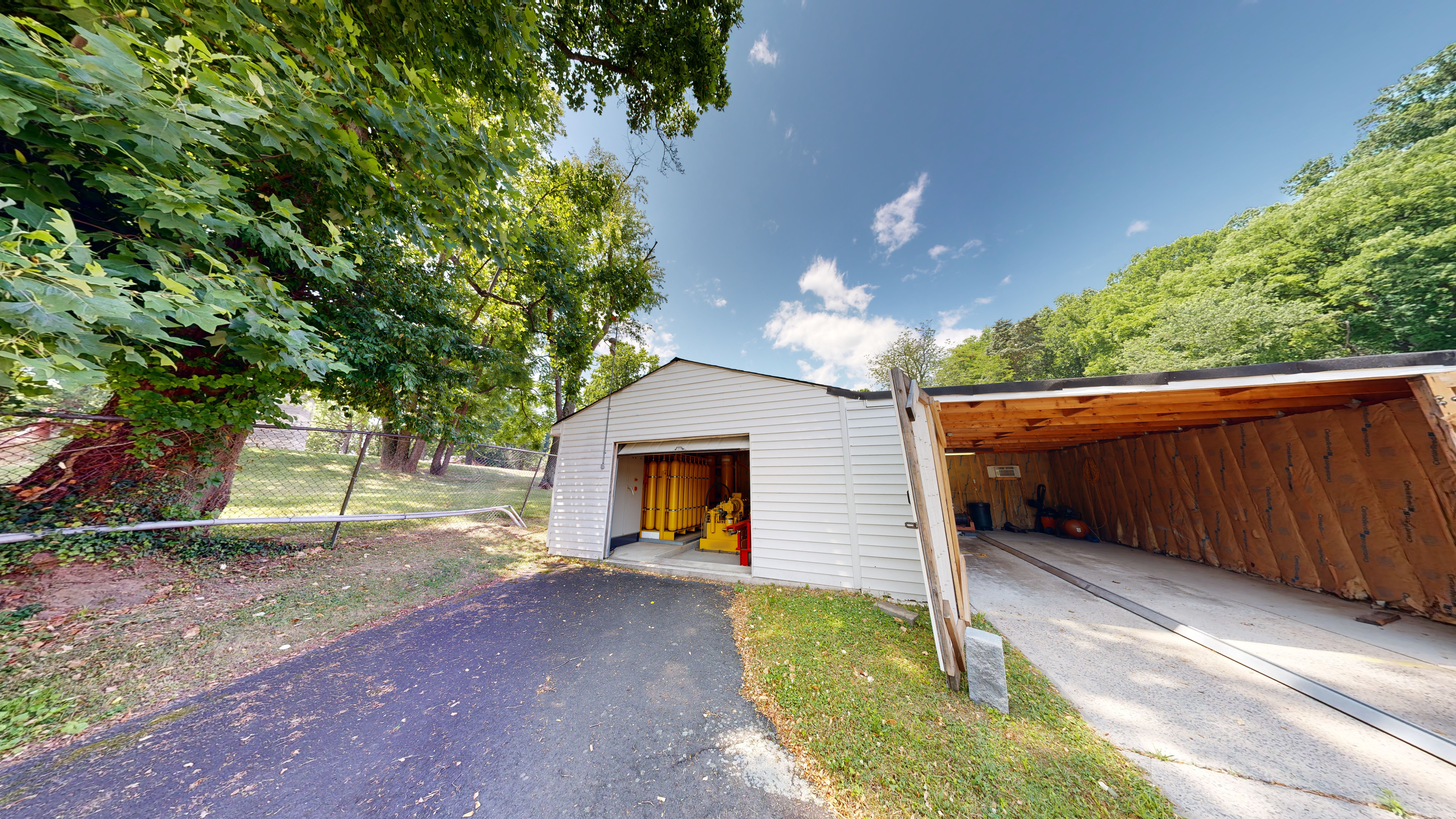 A garage area housing the propulsion system in the Federal Outdoor Impact Laboratory testing area.