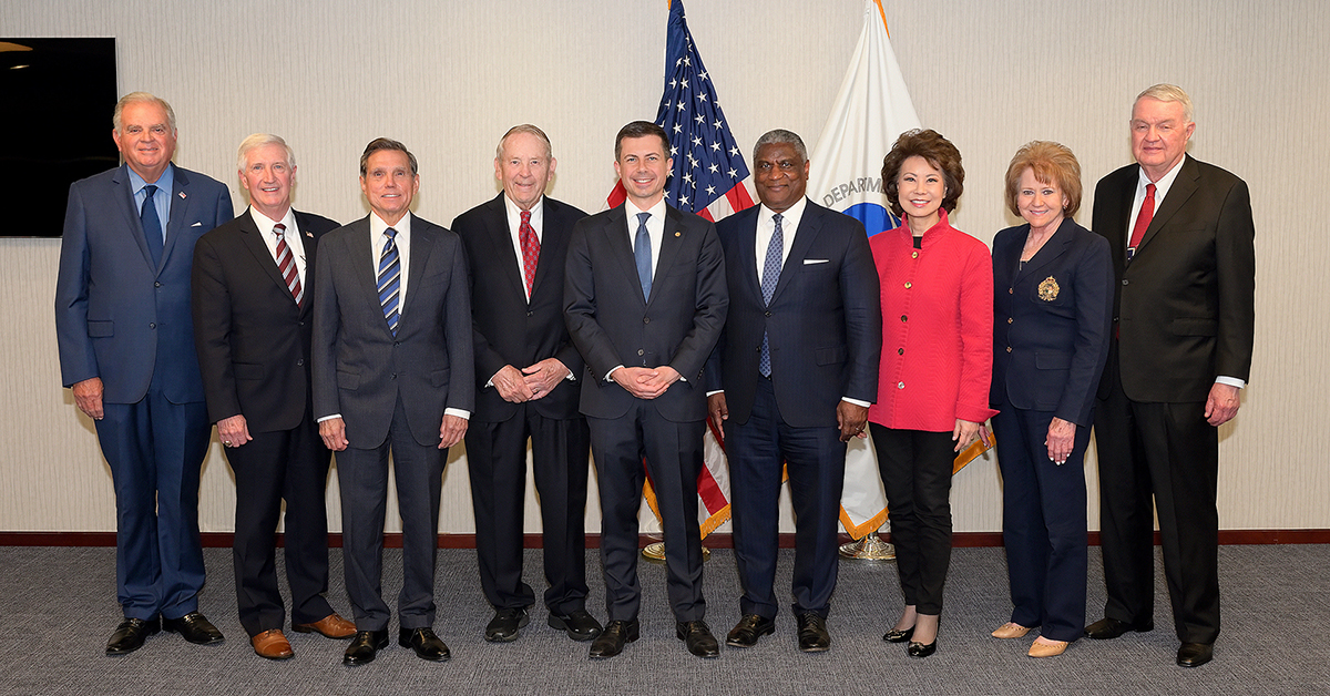 Eight former Secretaries of Transportation attended the naming ceremony to show their respect for Secretaries Coleman and Mineta.  Left to right:  Ray LaHood, Andrew Card, Federico Peña, Samuel K. Skinner, Secretary Pete Buttigieg, Rodney E. Slater, Mary E. Peters, Elaine Chao, and John Burnley IV.