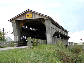 The Bigelow/Little Covered Bridge is located on Axe Handle Road in Union County, Ohio. With a length of 102 feet, the bridge crosses over the Little Darby Creek and was built in 1873.