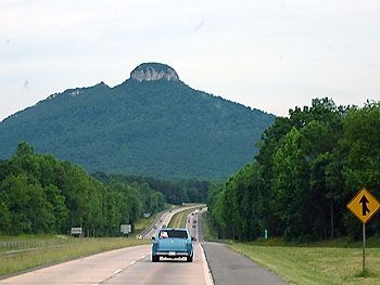 Route 52 traveling north with Pilot Mountain ahead.