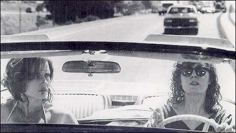 Geena Davis (left) and Susan Sarandon are two best friends whose weekend getaway unexpectedly takes them in an adventurous, often humorous race against time in Thelma and Louise, 1991. Photo: Courtesy of The Museum of Modern Art Stills Archive