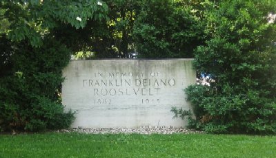 For many years, this marble block, sitting on the west corner of the National Archives grounds, was the only memorial to Franklin Delano Roosevelt, President of the United States from 1933 to 1945. A more fitting memorial was dedicated on May 2, 1997: the expansive, multi-chambered Franklin Delano Roosevelt Basin near the Jefferson Memorial.