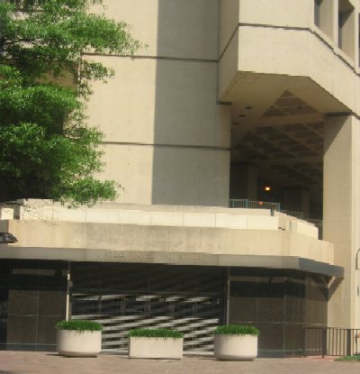 The Pennsylvania Avenue side of the J. Edgar Hoover Federal Bureau of Investigation (FBI) Building no longer displays the presidential panels that were shown in 1989. Hoover headed the FBI from 1924 until his death in 1972.