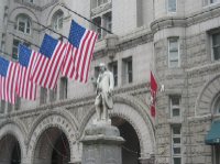 This statue of Benjamin Franklin, a postmaster during the Colonial period, sits in front of the Old Post Office Building.