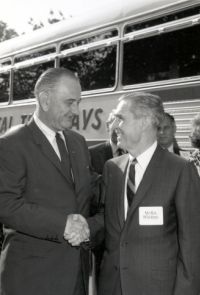 On May 11, 1965, President Lyndon B. Johnson greets Administrator Rex Whitton at the start of Lady Bird Johnson's 2-day Landscapes and Landmarks Tour of I-95 in Virginia to promote highway beautification.